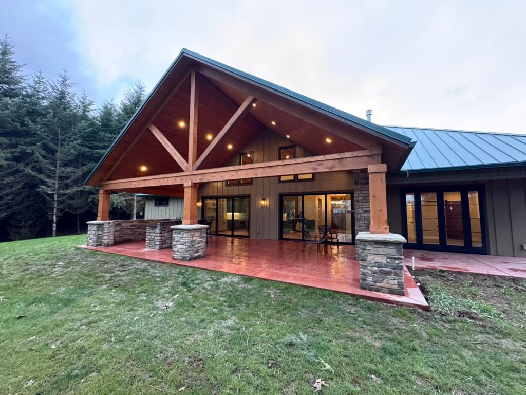 Refined outdoor living space connected to a custom Oregon home